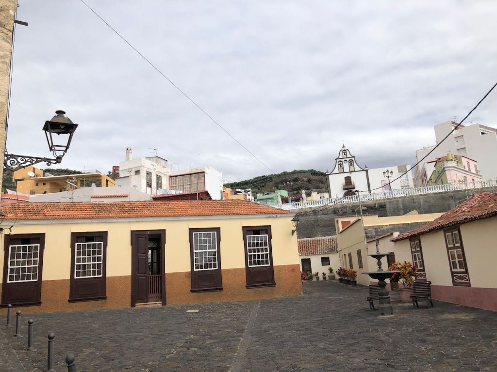 the plaza with a well and not far from here...