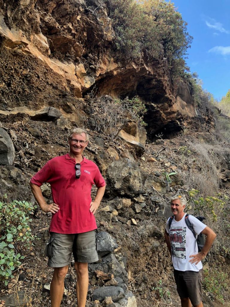the boys posing in front of another cave 😁